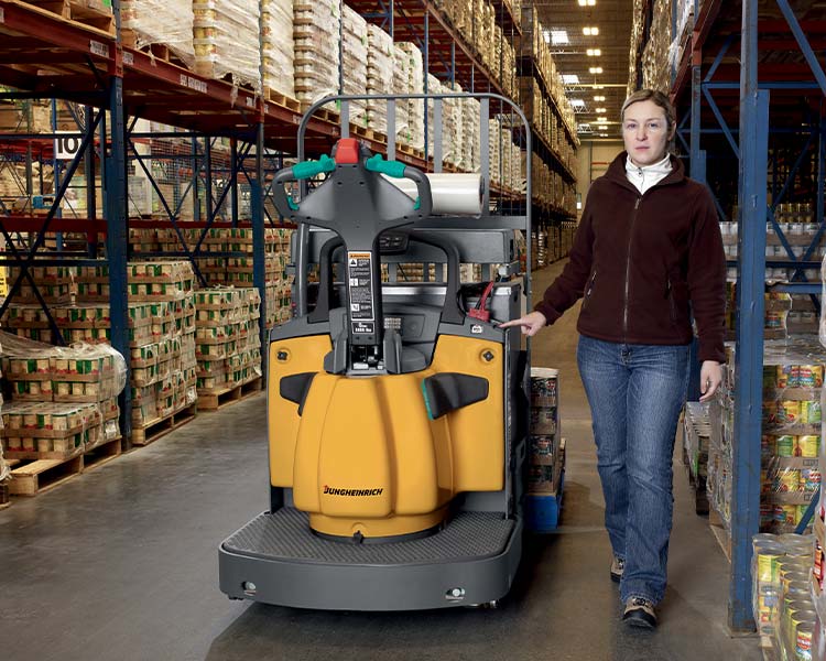 Electric walkie pallet jack with tight turn radius inside trailer