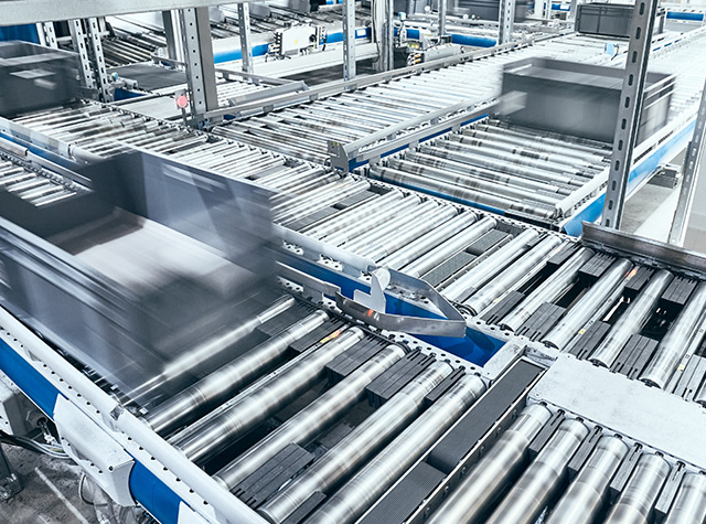 A warehouse conveyor system in motion.